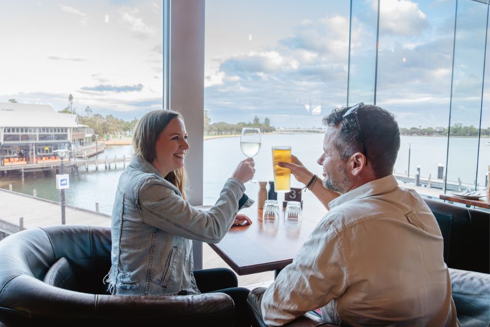 Couple enjoying drinks with a view at Brewvino Mandurah