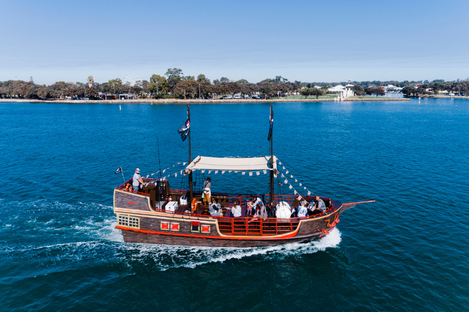 an aerial view of a pirate ship on the water